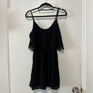 Casual black dress with crochet detail